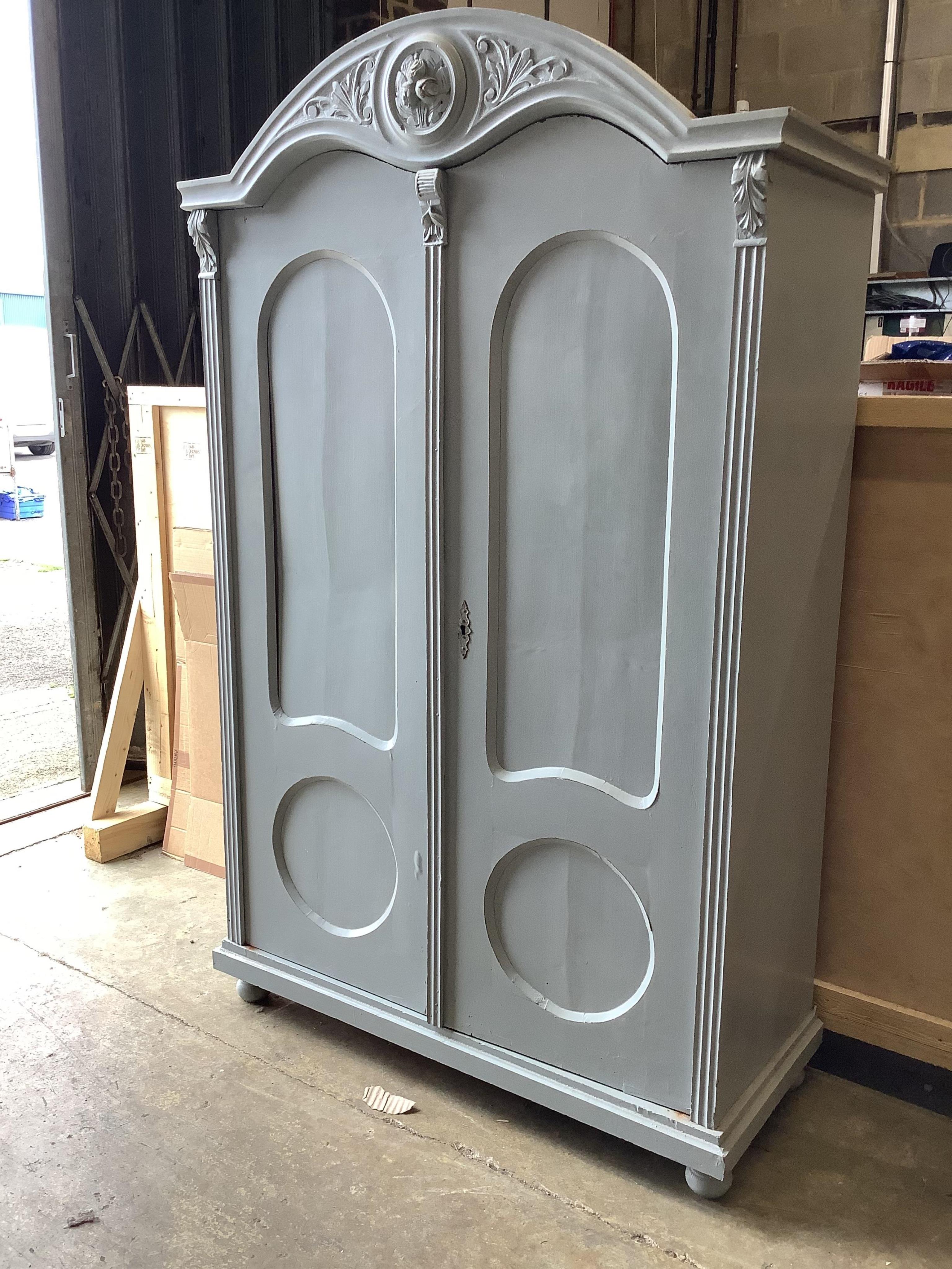 A Continental painted armoire, width 119cm, depth 50cm, height 190cm